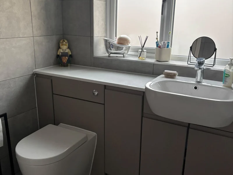 tiled grey bathroom
