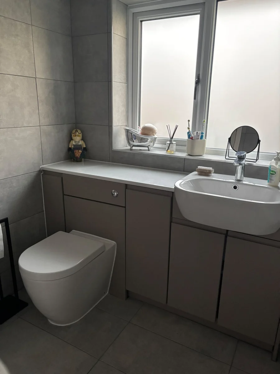 tiled grey bathroom